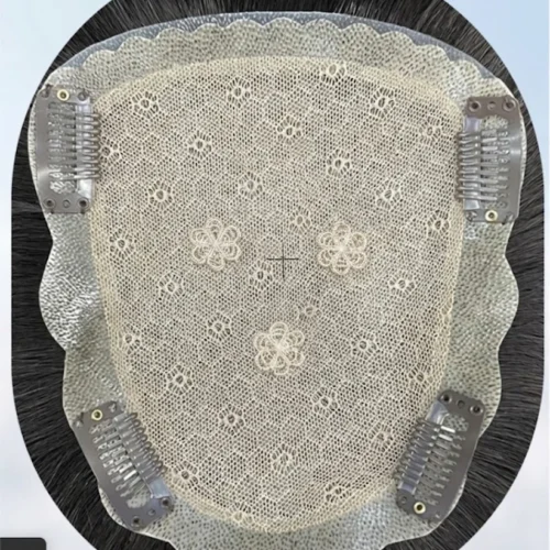 Premium human hair strands undergoing an energy cleansing process on a bed of raw quartz crystals, demonstrating SAMA PRIVÉ's demagnetization technology.